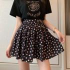 Cutout Printed Short-sleeve Top / Star Patterned Flare Skirt
