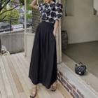 Set: Short-sleeve Tie-neck Dotted Blouse + Maxi A-line Skirt