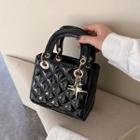 Patent Quilted Star Charm Crossbody Bag