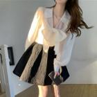 Puff-sleeve Bow Accent Shirt / High-waist A-line Mini Skirt