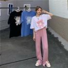 Short-sleeve Bear Print T-shirt / Front-slit Wide-leg Pants