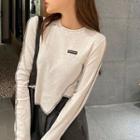 Long-sleeve Contrast Stitch Crop Top