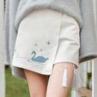 Tasseled Asymmetric Mini Skirt