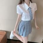 Short-sleeve Cropped Shirt / Neck-tie / Chain Strap / Mini A-line Skirt