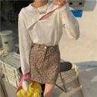 Cutout Plain Long-sleeve T-shirt / Leopard Printed High-waist A-line Mini Skirt