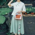 Set: Elbow-sleeve Cheongsam Top + Embroidered Midi A-line Skirt