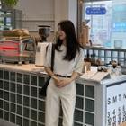 Short-sleeve Zip-back Blouse
