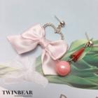 Non-matching Statement Bow Earring