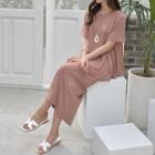 Set: Round-neck A-line T-shirt + Slit-back Skirt