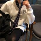 Embroidered Pullover With Tie / Mini Accordion Pleated Skirt