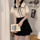 Short-sleeve Sailor Collar Top / Pleated Skirt