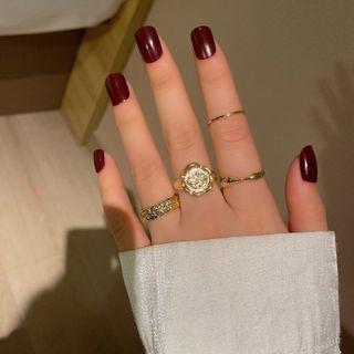 Set Of 4 : Alloy Ring (assorted Designs)