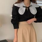 Long-sleeve Eyelet Lace Tie-neck Blouse