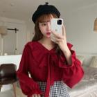 Long-sleeve Ruffled Tie-front Blouse
