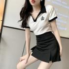 Short-sleeve Crown Embroidered Polo Shirt / Shirred A-line Skirt
