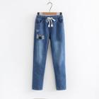 Fleece-lined Embroidered Straight-fit Jeans