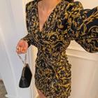 Puff-sleeve Shirred Patterned Wrap Dress