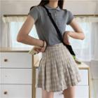 Cropped Short-sleeve Polo Shirt / Plaid Pleated Skirt