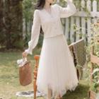 Set: Puff-sleeve Ruffled Blouse + A-line Mesh Skirt