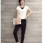 Set: Short-sleeve Paneled T-shirt + Striped Pants