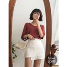 Asymmetric-hem Linen Miniskirt