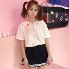 Set: Short-sleeve Cross Polo Shirt + A-line Skirt