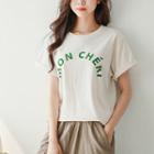 Slit-side Letter-printed T-shirt