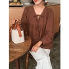 Puff-shoulder Tie-neck Shirred Blouse