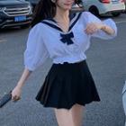 Cropped Sailor-collar Bow Puff-sleeve Top / High-waist Pleated A-line Skirt