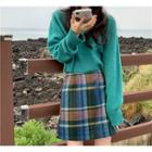 Long-sleeve Plain Sweater / Plaid Mini Skirt