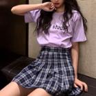 Short-sleeve Lettering T-shirt / Plaid Pleated Skirt