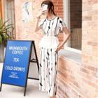 Set: Short-sleeve Patterned Paneled Frill Trim Top + Cropped Straight Fit Pants