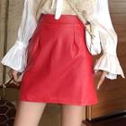 Knit Vest / Bell-sleeve Blouse / Faux Leather Mini A-line Skirt