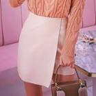 Overlock-stitch Faux-leather Wrap Miniskirt