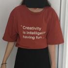 Plain A-line Skirt / Lettering Elbow Sleeve T-shirt
