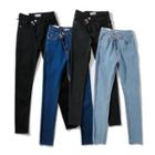 Irregular Two-breasted High-rise Skinny Jeans