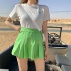 Moon Embroidered Short-sleeve T-shirt / High-waist Mini Pleated Skirt
