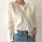 Long-sleeve Buttoned Asymmetrical Knit Top