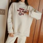 Mock-neck Smiley-embroidered Pullover