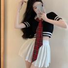 Short-sleeve Knit Top / Pleated Skirt / Tie