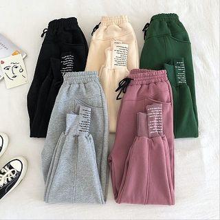 Lettering Print Asymmetric High-waist Jogger Pants