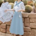 Set: Puff-sleeve Floral Embroidered Tie-neck Blouse + Midi A-line Skirt
