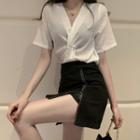 Set: Short Sleeve V-neck Knotted Top + Double Zipper Mini A-line Skirt