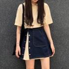 Asymmetric Button Denim Mini A-line Skirt