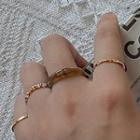 Set Of 4 : Rhinestone / Alloy Ring (assorted Designs) Set Of 4 - Type A - Gold & Brown - One Size