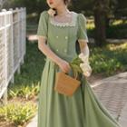 Set: Short-sleeve Lace Trim Double-breasted Blouse + Midi A-line Skirt