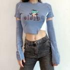 Long Sleeve Graphic Cut-out Crop Top