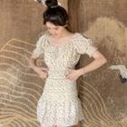 Puff-sleeve Floral Cropped Blouse / Ruffle Hem Mini Skirt
