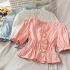 Ruffled-trim Smocked V-neck Blouse