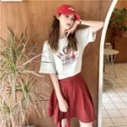 Short-sleeve Cartoon Print T-shirt + Plain Mini Skirt